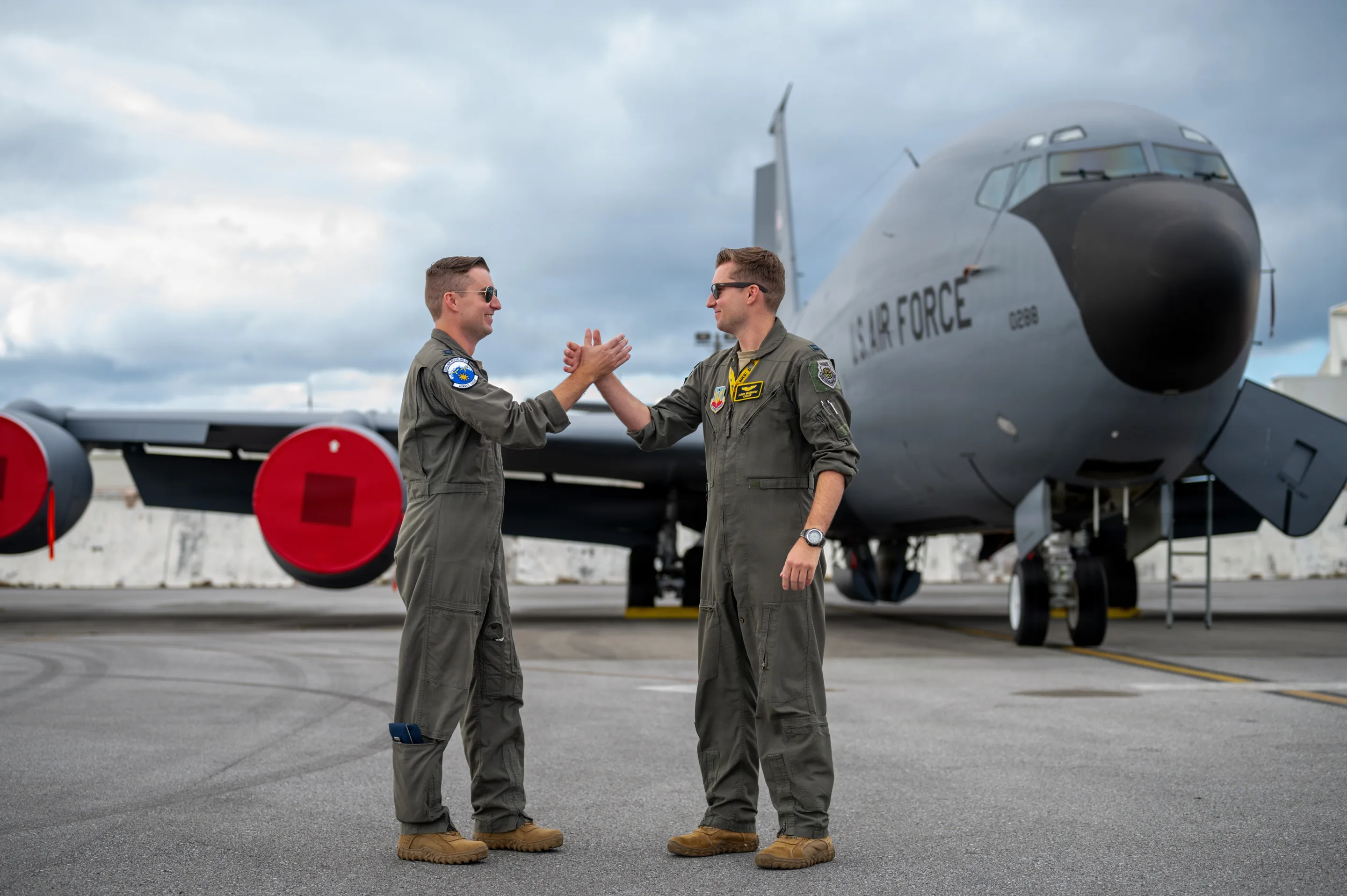 Board of Inquiry Attorneys in front of Military Aircraft